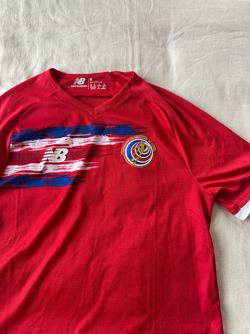 New Balance — Polo Deportivo, Talla S